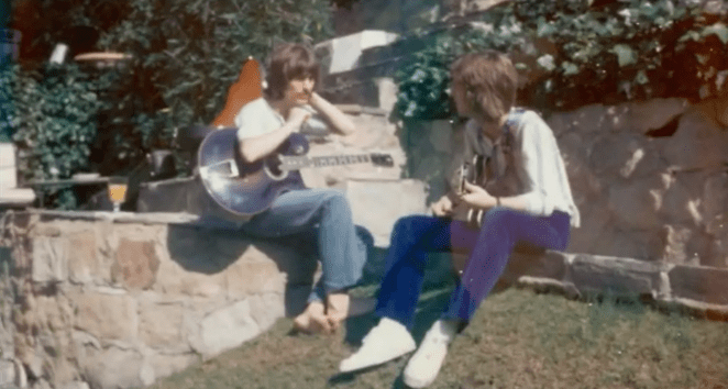 eric clapton and george harrison with style o guitar